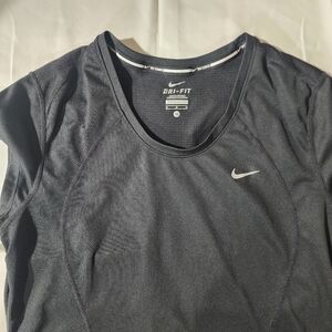 NIKE DRY-FIT Woman M size. Color black. Pre-loved